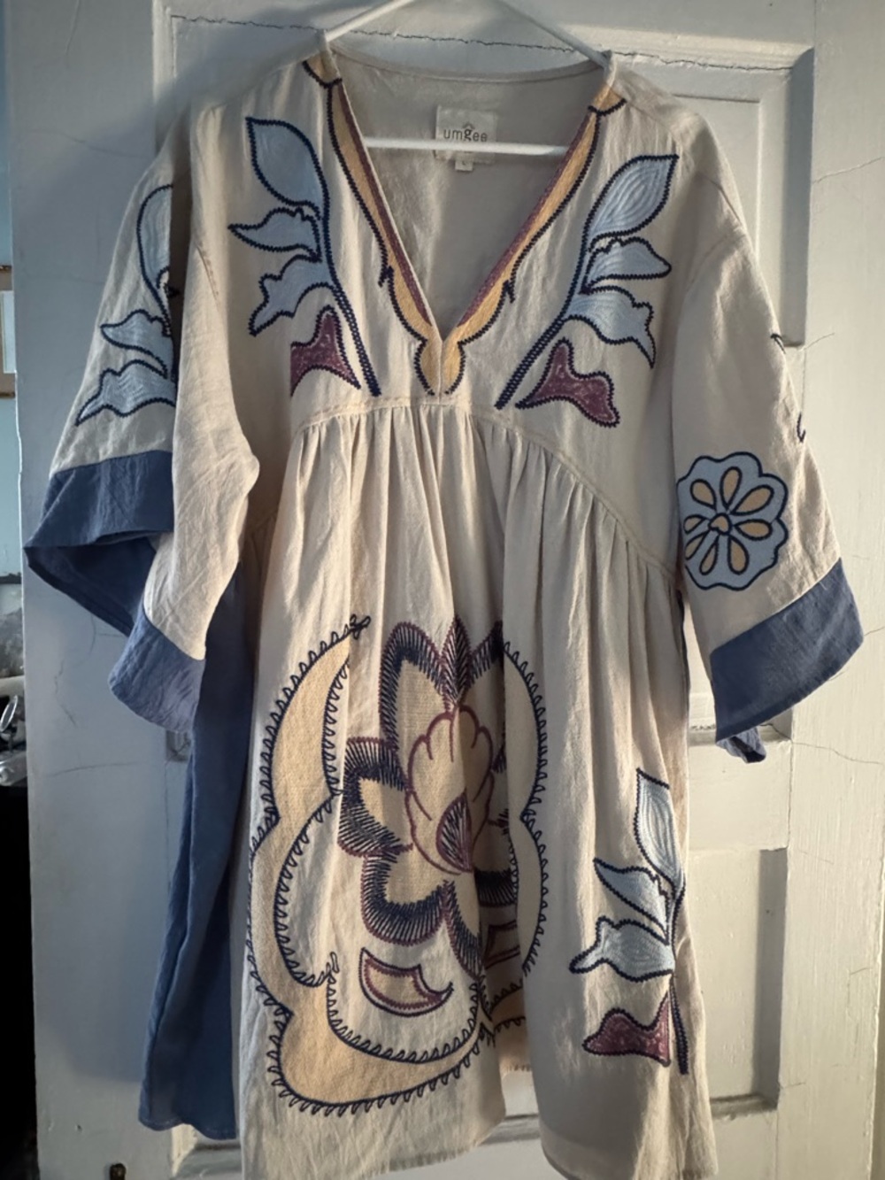 Umgee Cream Tunic with Blue Trim and Multicolor Embroidery